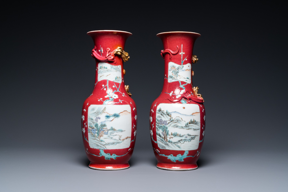 A pair of Chinese famille rose ruby-ground vases, 19th C.