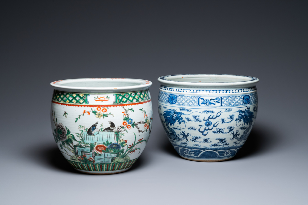 A Chinese blue and white 'dragons' fish bowl and a famille verte 'magpies' fish bowl, 19th C.