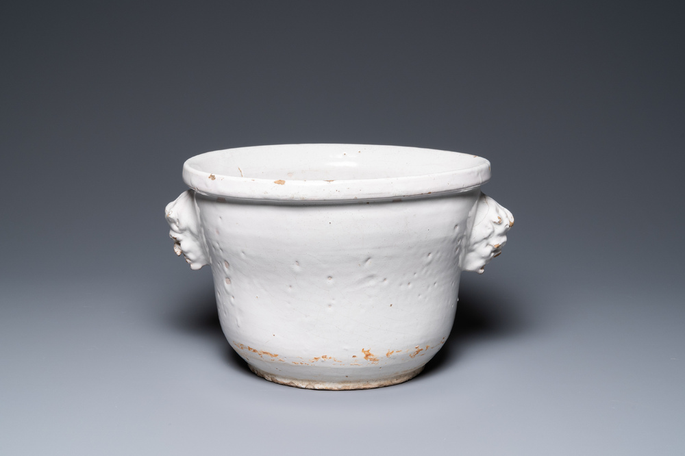 A large monochrome white-glazed French faience fruit bowl, dated August 1770