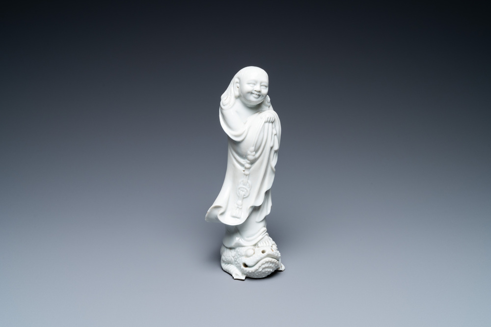 Een Chinese Dehua blanc de Chine figuur van Liu Hai met de pad, zegelmerk, Kangxi