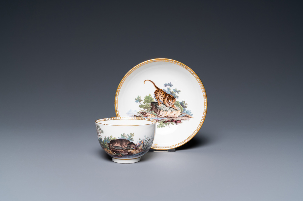 A The Hague-decorated Ansbach porcelain 'leopard and otter' cup and saucer, 18th C.