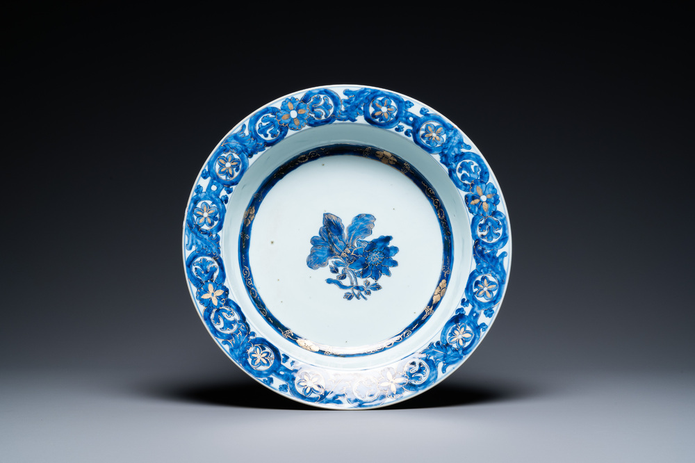 A large Chinese blue, white and gilt 'Merian' deep dish, Qianlong