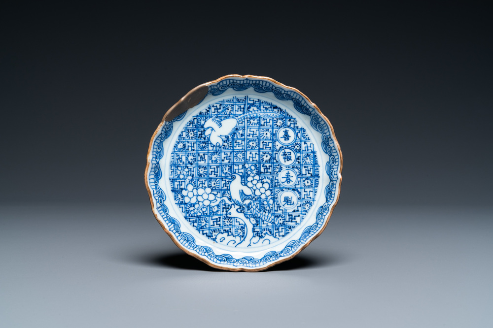 A Chinese blue and white shonzui ko-sometsuke dish with birds and calligraphy for the Japanese market, Chongzhen