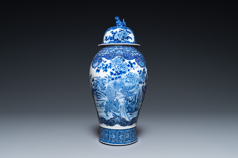A massive Japanese blue and white Seto vase and cover with shishi and an eagle, Meiji, 19th C.