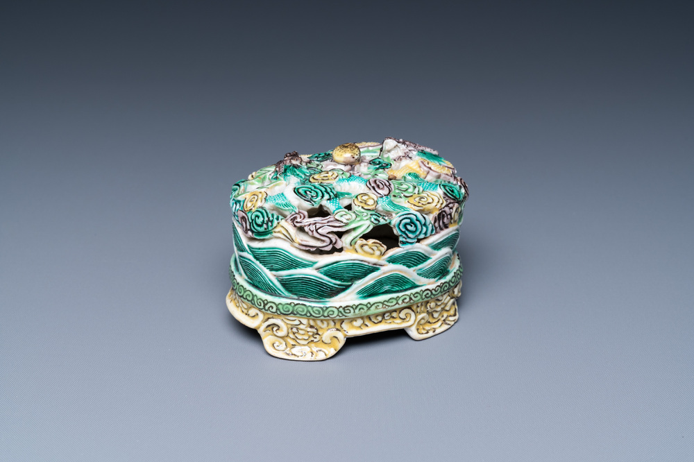 A Chinese verte biscuit incense holder, 19th C.