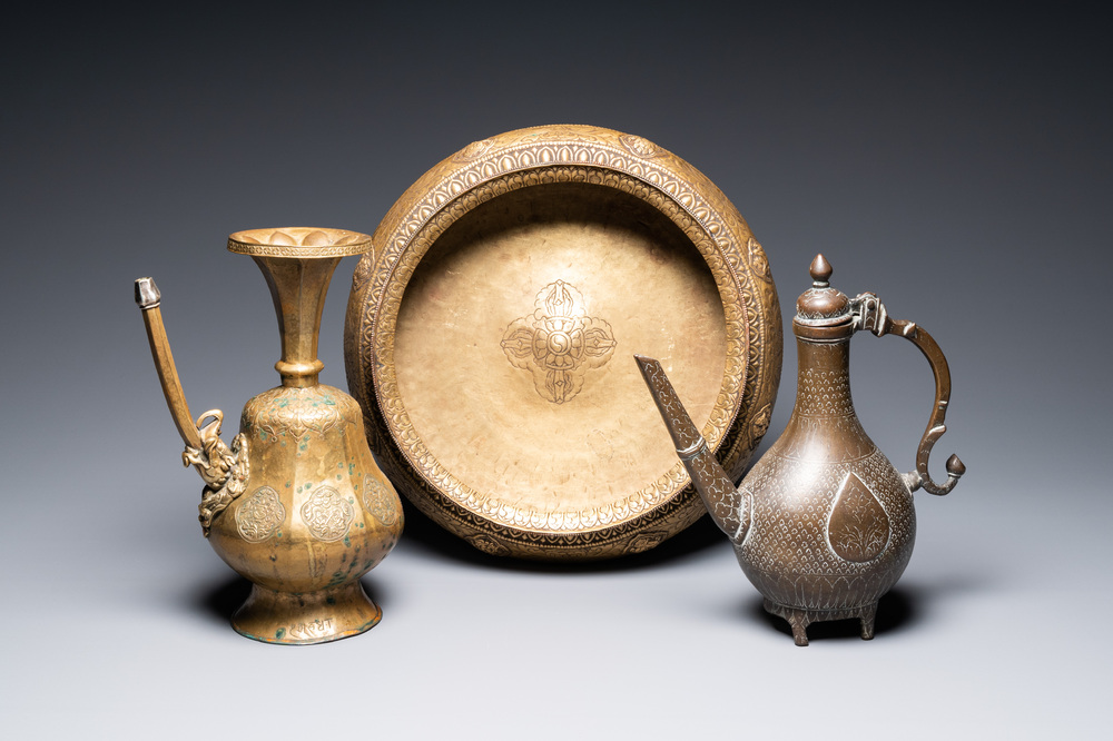 A Tibetan brass ewer, an alms bowl and an Indian bronze ewer, 18/19th C.