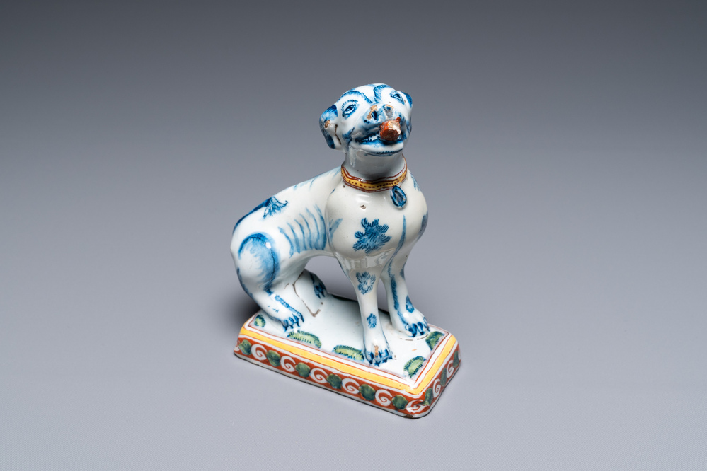 A polychrome Dutch Delft dog, 18th C.