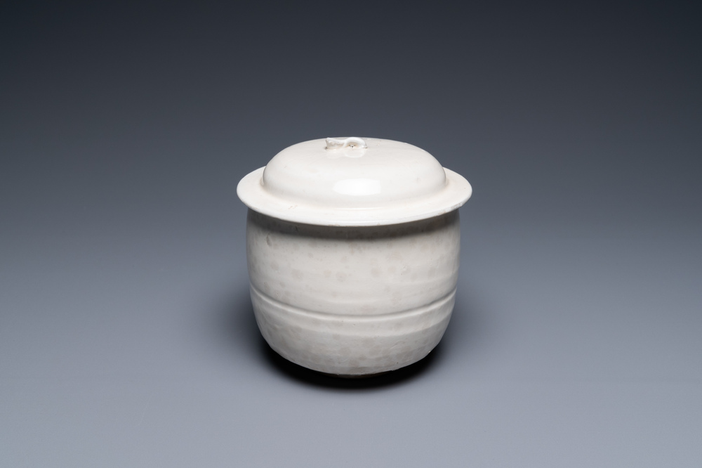 A Chinese cream-glazed jar and cover, Northern Song