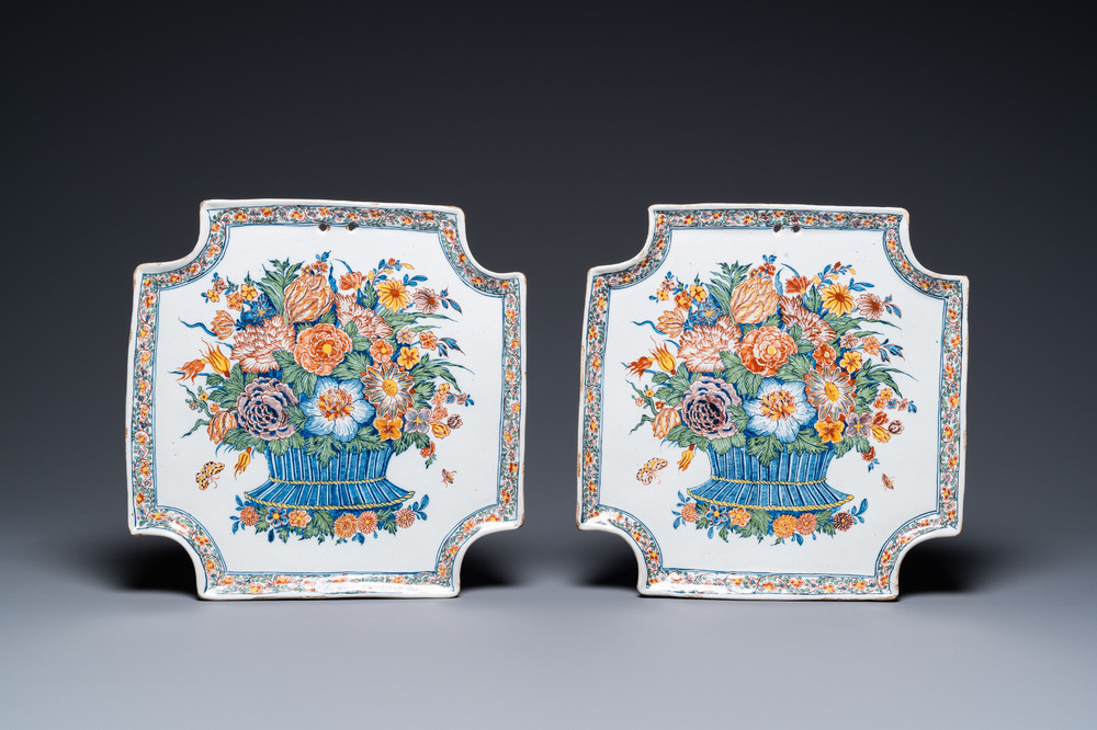 A pair of exceptionally fine polychrome Dutch Delft flower basket plaques, 18th C.