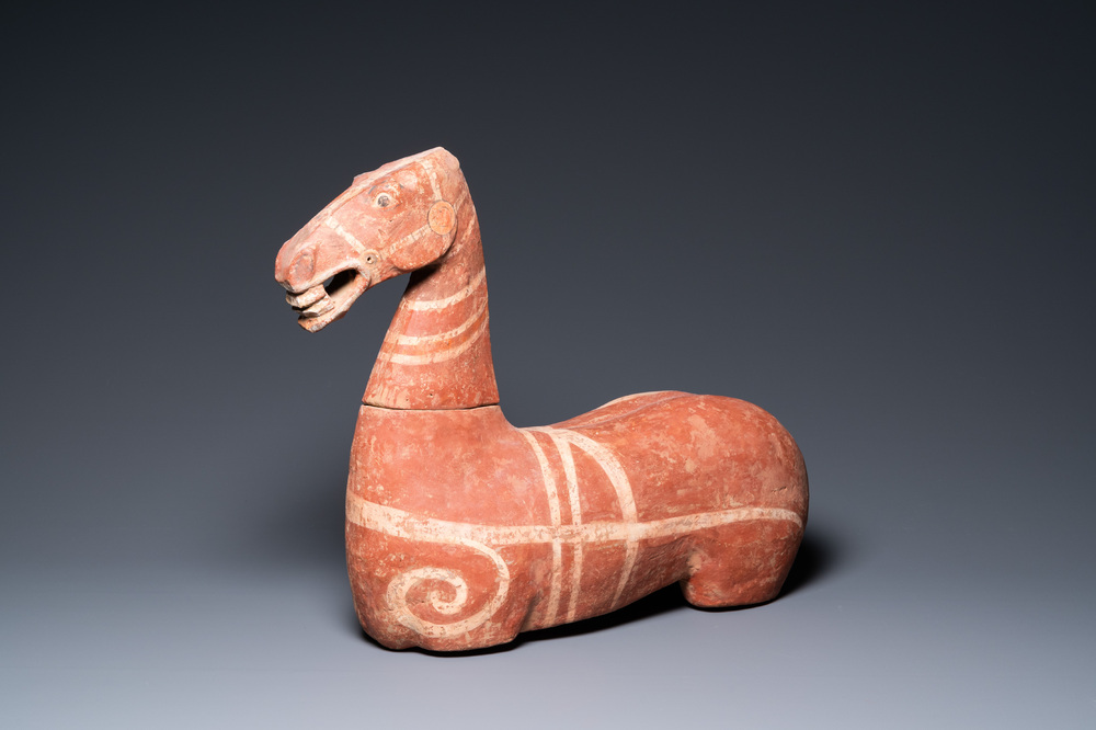 An attractive Chinese painted pottery model of a horse, Han
