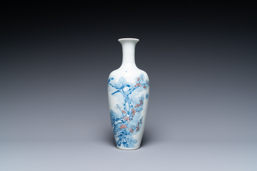 A Chinese blue, white and copper-red 'magpie and prunus' vase, Kangxi mark, 19/20th C.