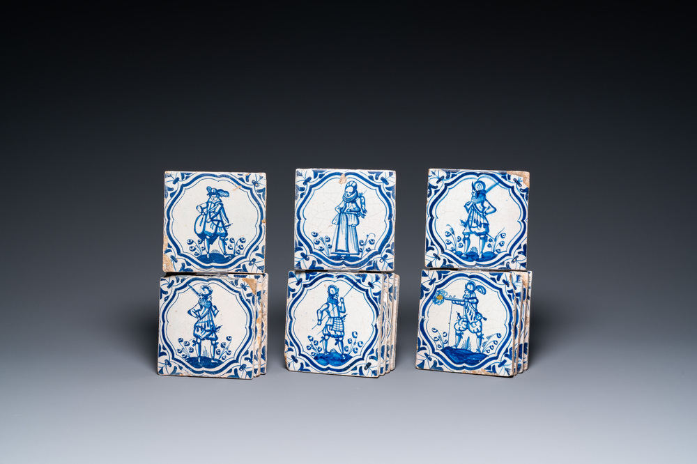 Fourteen Dutch Delft blue and white tiles with mostly Spanish soldiers after Jacob de Gheyn II, 17th C.