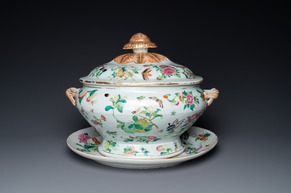 A Chinese Canton famille rose 'butterflies' tureen and cover on stand, 19th C.