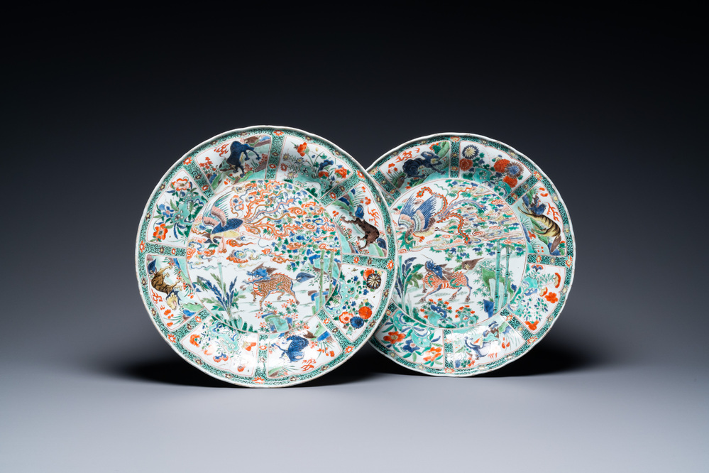 A pair of Chinese famille verte 'mythical animals' dishes, seal marks, Kangxi