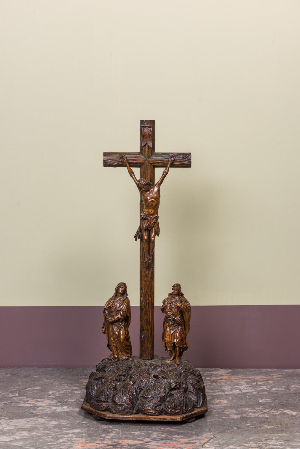 A Flemish oak and walnut 'Golgotha' group, probably Antwerp, 17th C.