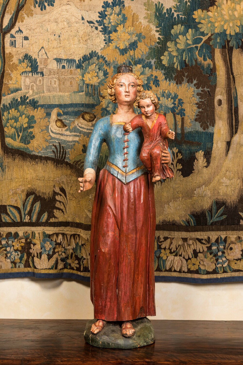 A large polychromed wooden Madonna and Child, 17/18th C.