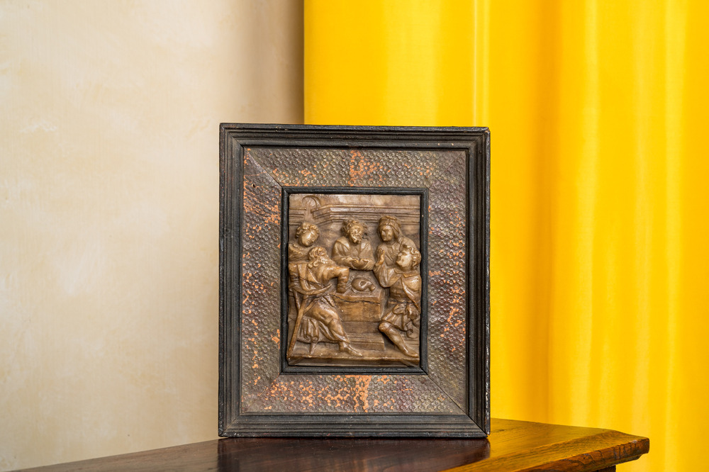 An alabaster relief depicting 'The breaking of the bread', Malines, 17th C.