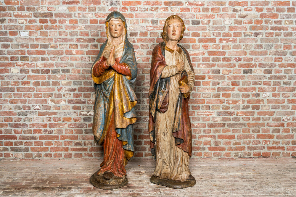 Two large polychromed and gilt walnut wooden figures of Mary and John the Baptist, Southern France or Northern Italy, late 15th C.