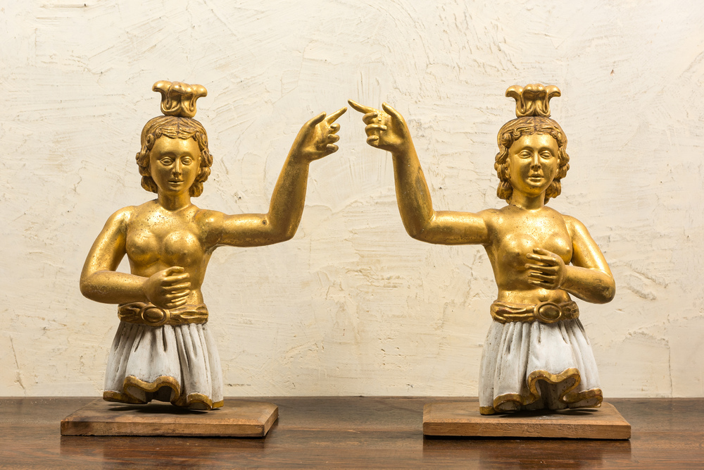 A pair of gilt and patinated wooden female figures, probably Italy, 18th C.