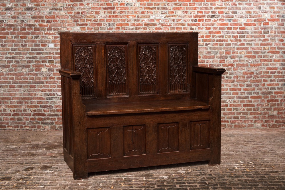 An oak wooden chest-bench, 16th C. and later