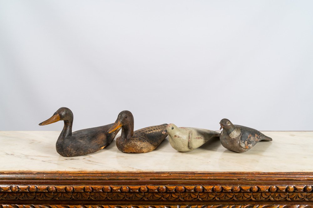 Two polychrome wooden decoy ducks and two pigeons, 19/20th C.