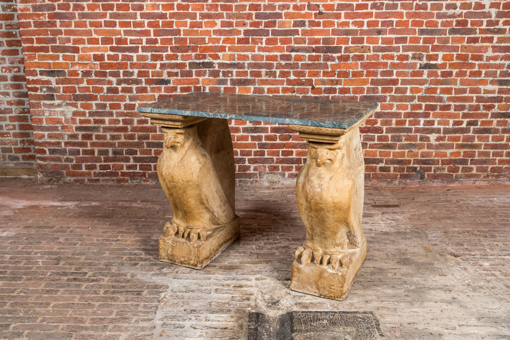 A console composed of a green marble top resting on two resin falcon-shaped supports, 20th C.