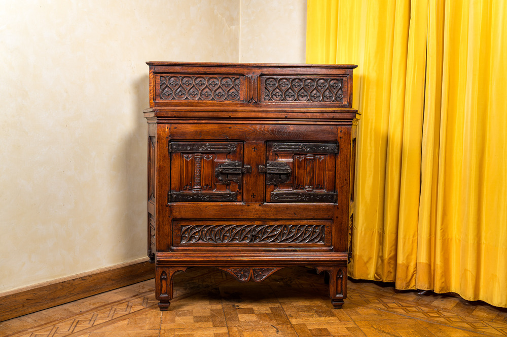 A wooden Gothic Revival buffet with older elements and wrought iron mounts, 19th C.