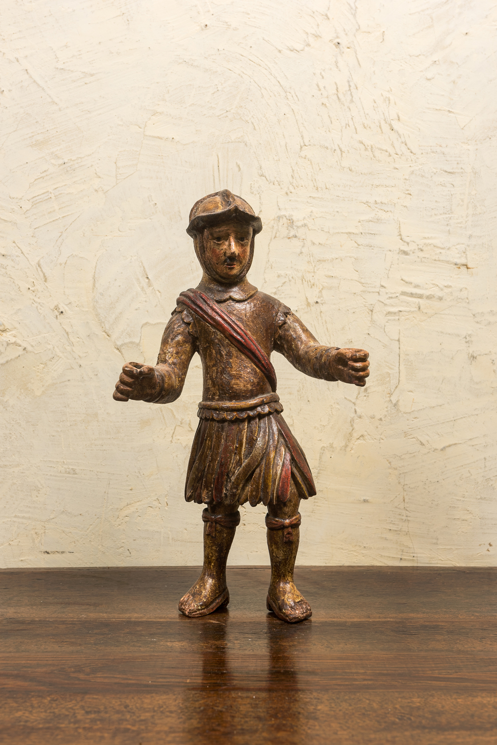 A polychrome wooden figure of a soldier, 17th C.