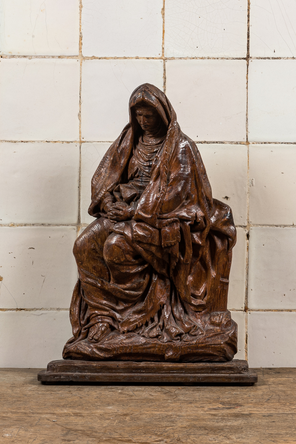 A Flemish oak sculpture of the Lamentation of the Virgin, late 16th C.