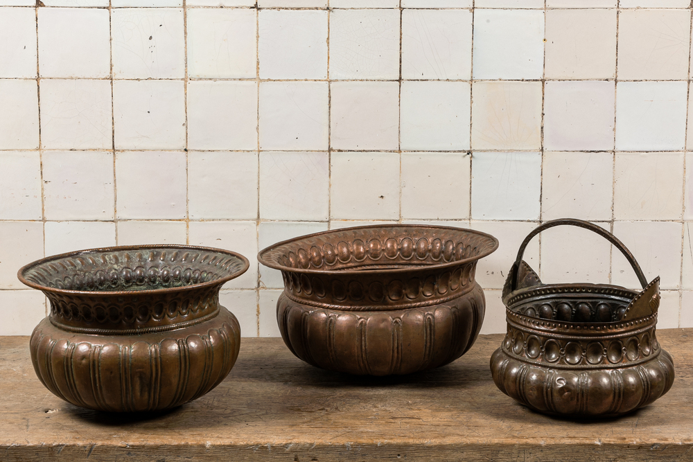 Two hammered brass basins and a handled kettle, Italy, 17th C. and later