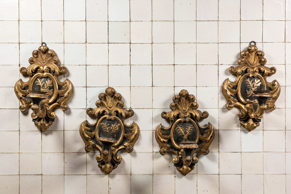 Two pairs of Louis XV-style gilt and blackened appliques with candlesticks, 18th C.