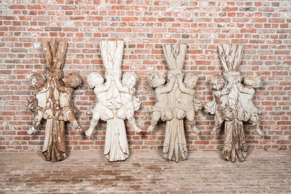 Four large white patinated wooden sculptures with two cherubs on a knotted curtain, 19th C.