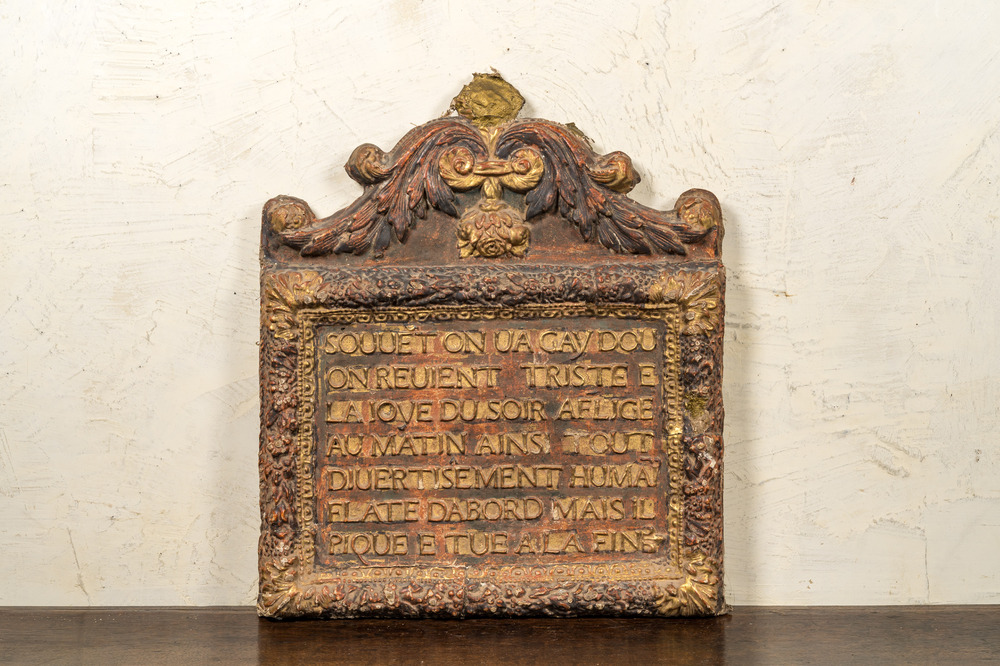 A red lacquered and gilt canvas on wood panel with Protestant text, South East of France, 18th C.