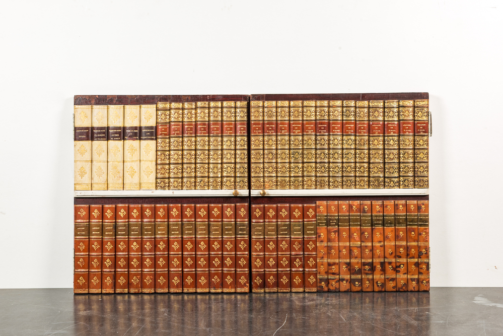 Two trompe l'oeil cupboard doors with book bindings, 1st half 20th C.