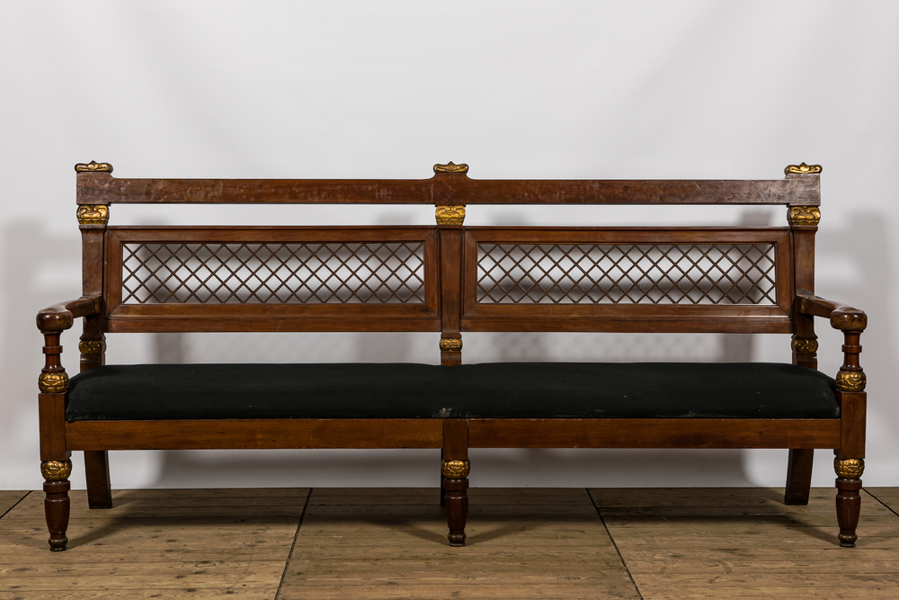 A lavish partly gilt upholstered mahogany bench, probably France, 19th C.