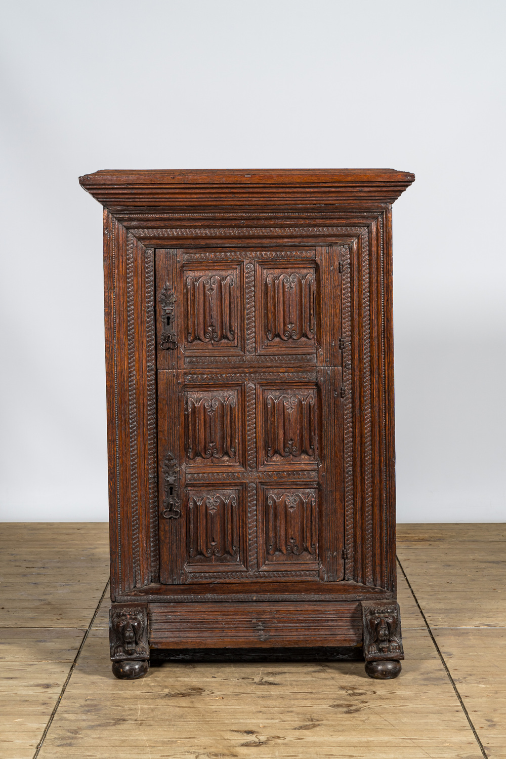 A gothic oak two-door cupboard with linenfold panels, Northern Germany, 16th C.