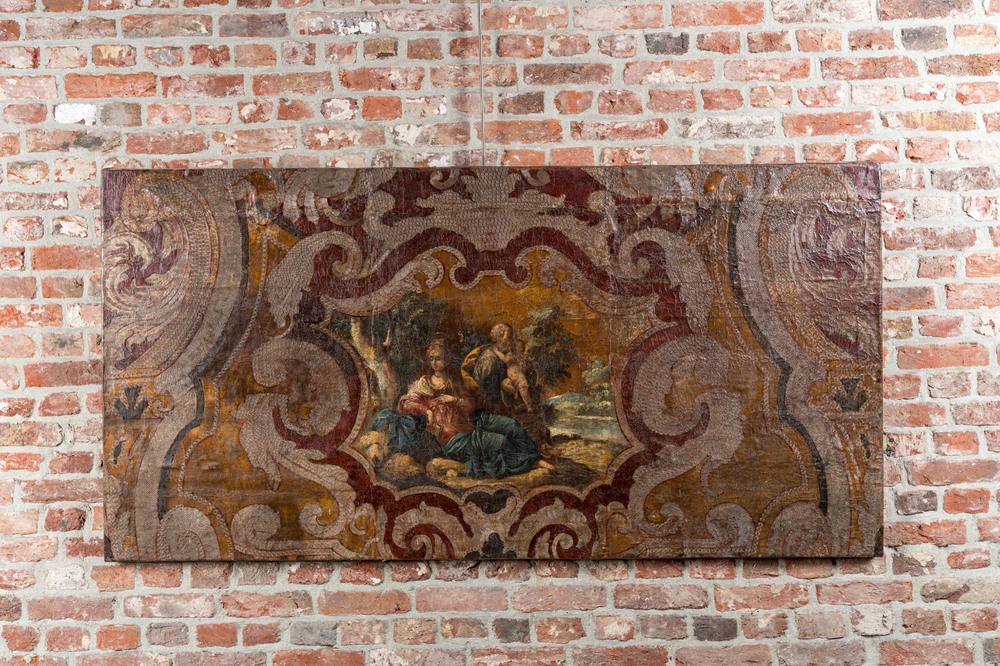 A Flemish painted leather panel depicting 'The Rest on the Flight into Egypt', 17th C.