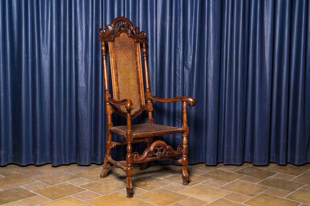 An English wooden wicker-backed armchair, 18th C.