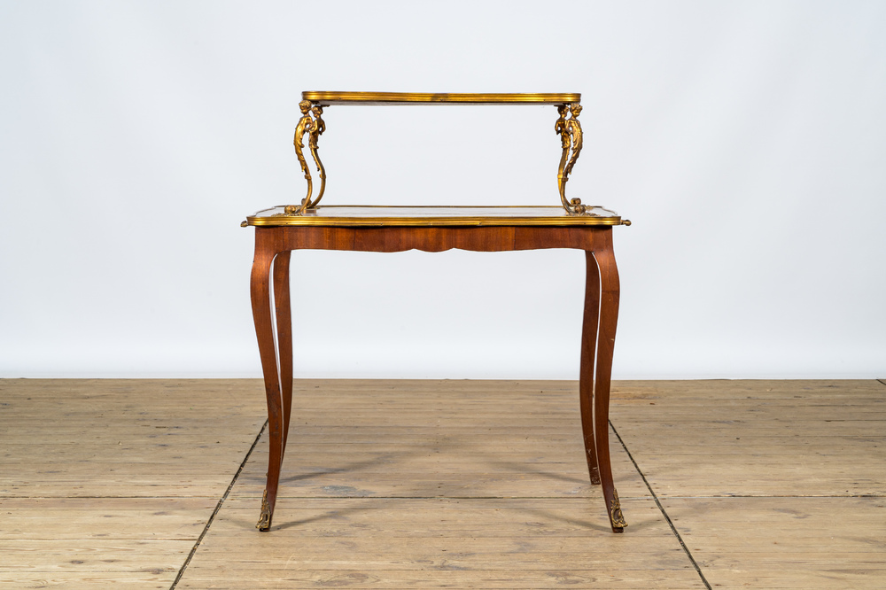 A French gilt bronze mounted mahogany &eacute;tag&egrave;re or serving table, 19/20th C.