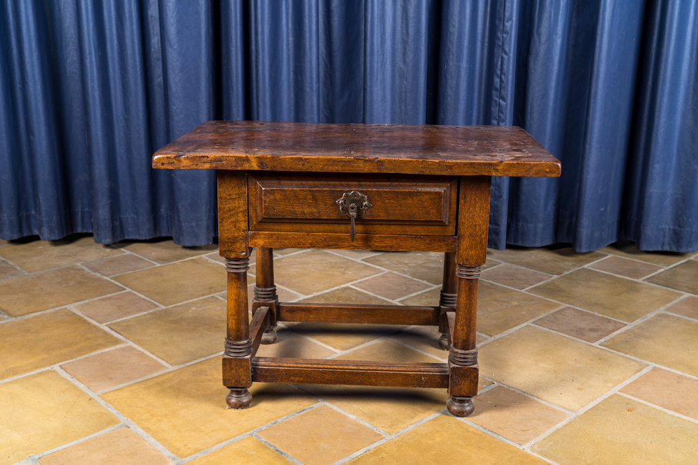 A walnut and oak side table with a drawer, 17th C. and later