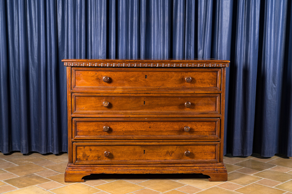 A walnut four-drawer commode, 19th C.