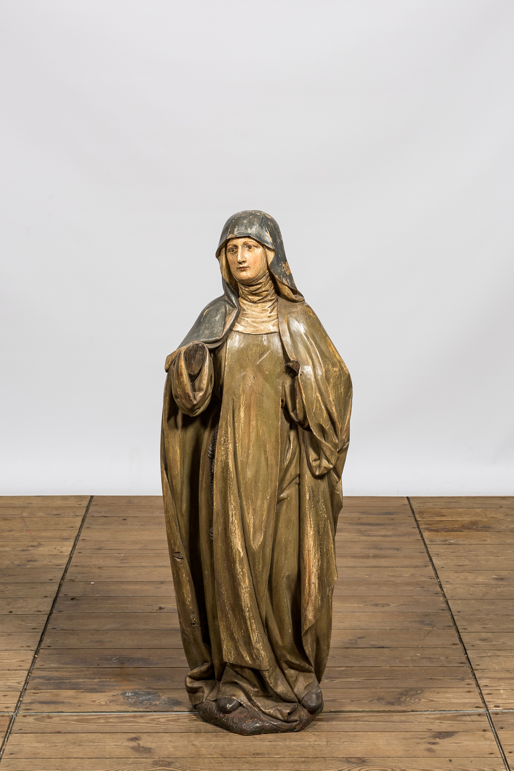 A polychrome wooden figure of Teresa of &Aacute;vila, 19th C.