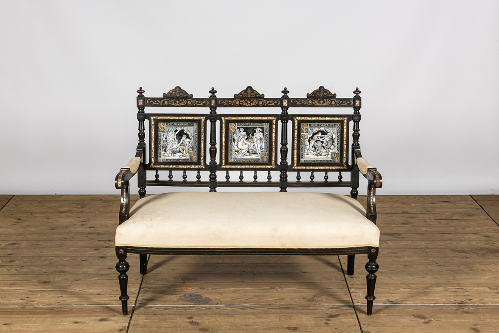 An English ebonised wooden sofa with mother-of-pearl inlaid and three Minton Waverley plaques by John Moyr Smith (1839-1912), 19th C.