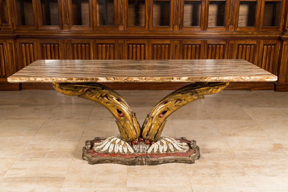 A polychromed and gilt wooden console table with onyx marble top, probably Italy, 19/20th C.