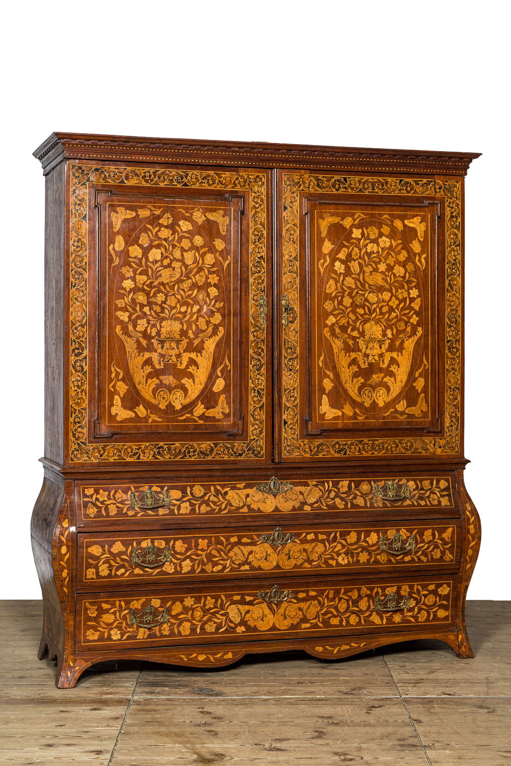 A Dutch mahogany floral marquetry cabinet with two doors and three drawers, 18/19th C.