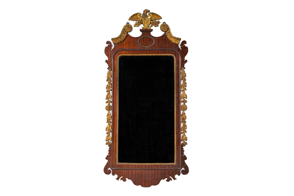 A gilt copper-mounted mahogany mirror with an American eagle, 19/20th C.