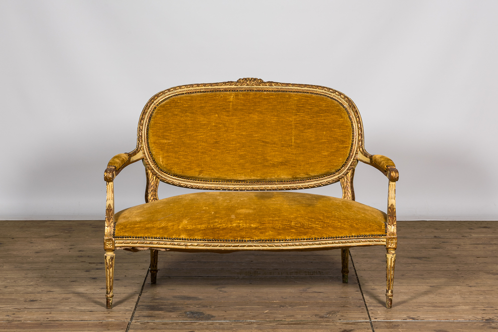 A French partly gilt and white patinated Louis XV-style sofa, 18/19th C.