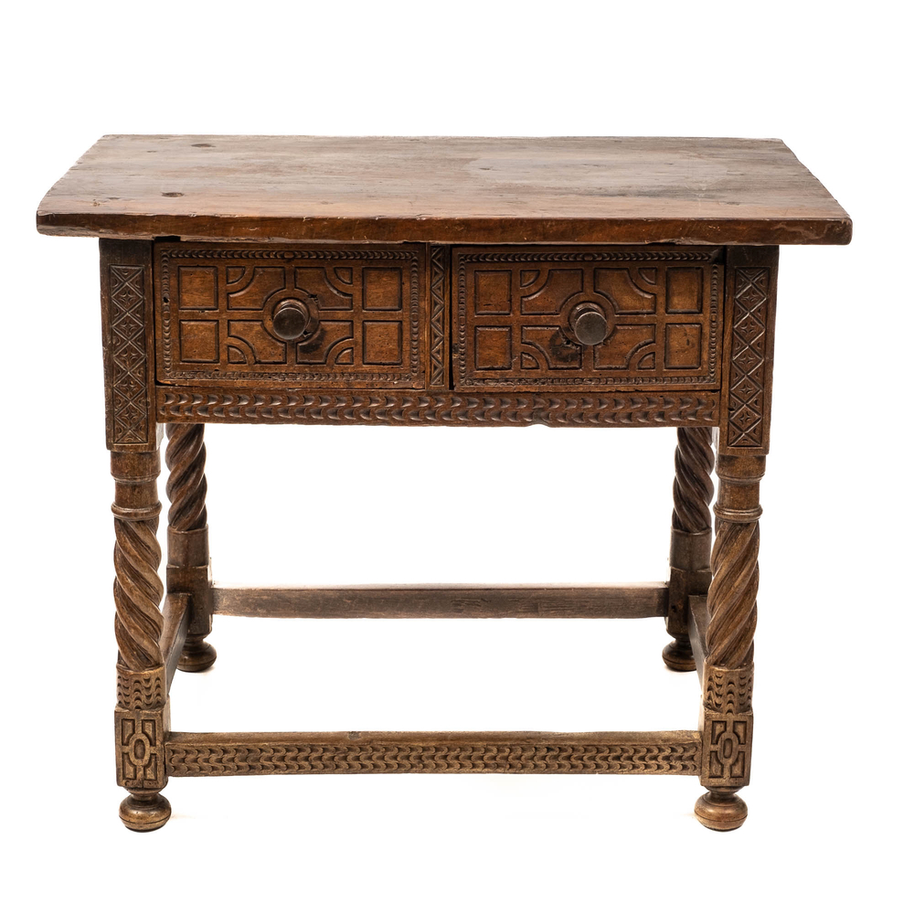 A Spanish walnut table with two drawers, 17th C. with later elements