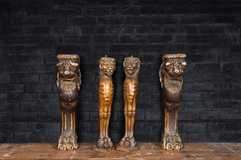 Two pairs of sculpted wooden table legs in the shape of lions, 19th C.