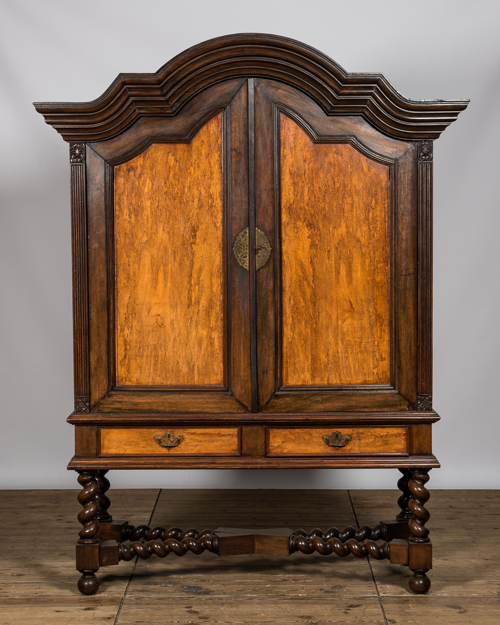 A mahogany two-door cabinet on foot, 19/20th C.